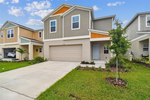 view of front of house featuring a garage and a front lawn