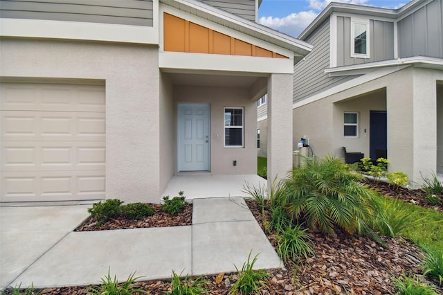 doorway to property featuring a garage