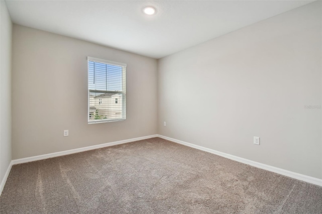 view of carpeted spare room