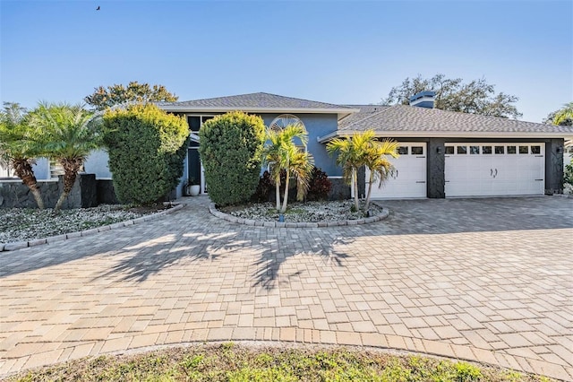 view of front of property featuring a garage