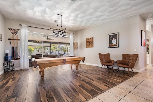 recreation room with ceiling fan, hardwood / wood-style floors, and billiards