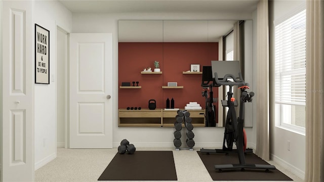 workout area with carpet floors