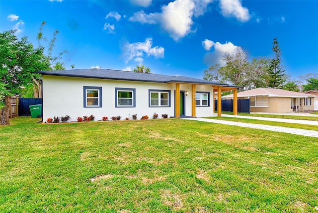 view of front of property with a front lawn