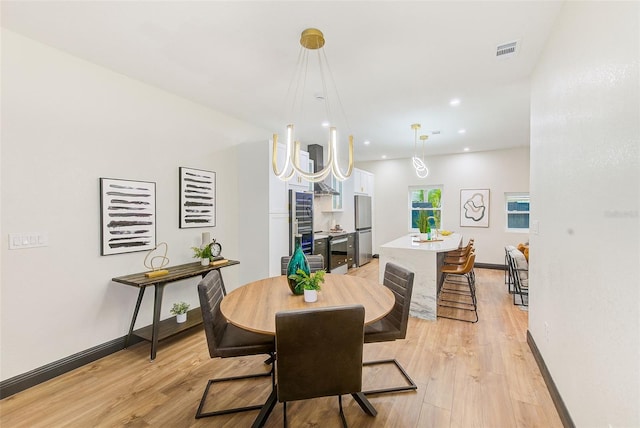 dining space featuring light hardwood / wood-style flooring