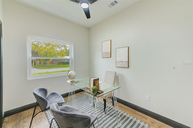 office with ceiling fan and wood-type flooring