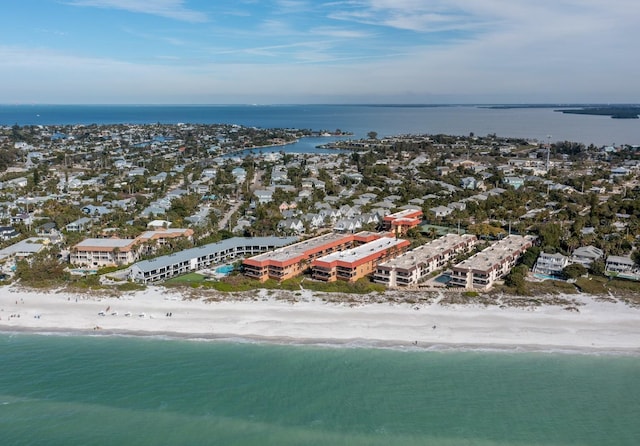 aerial view with a water view and a beach view