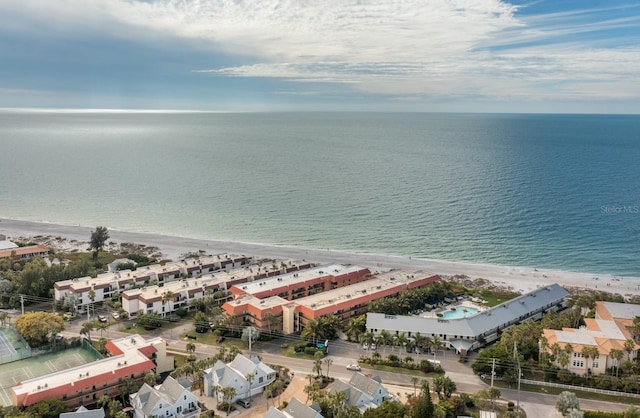 aerial view featuring a view of the beach and a water view