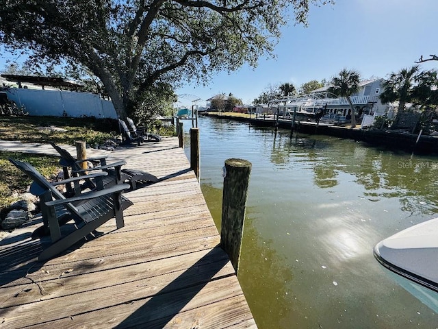 view of dock with a water view