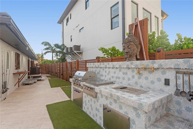 view of patio featuring area for grilling and grilling area