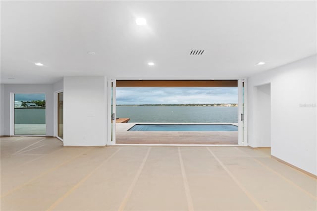 interior space with a water view