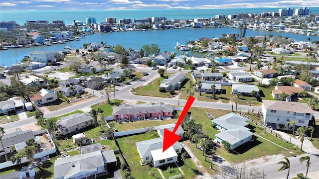 birds eye view of property featuring a water view