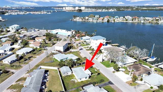14140 E Parsley Dr, Madeira Beach, FL 33708 - aerial overview of property's location with a large body of water and nearby suburban area