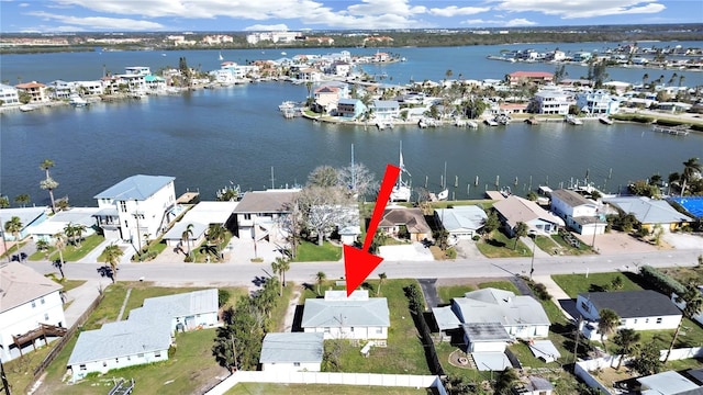 birds eye view of property featuring a water view