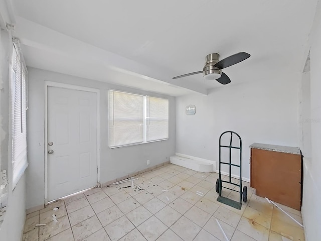 spare room with ceiling fan