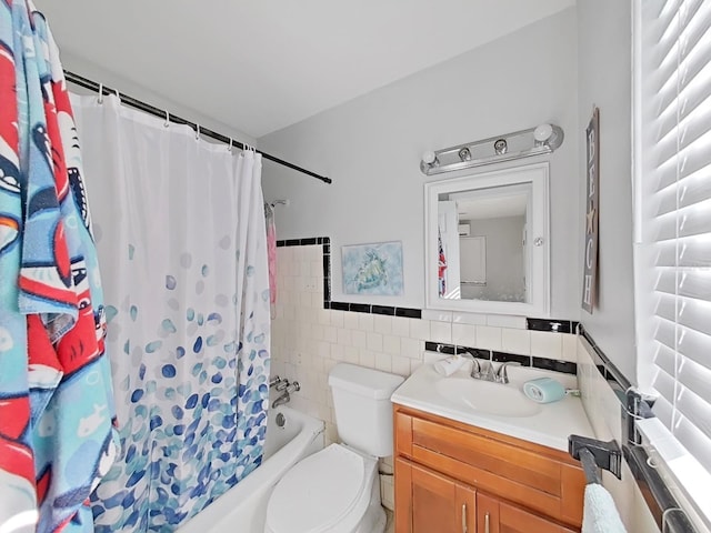 full bathroom featuring tile walls, vanity, shower / tub combo, and toilet