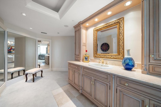 bathroom featuring vanity and crown molding