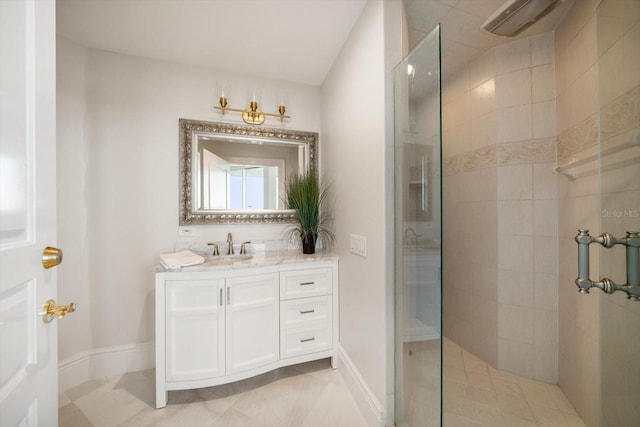 bathroom with tile patterned flooring, vanity, and a shower with shower door