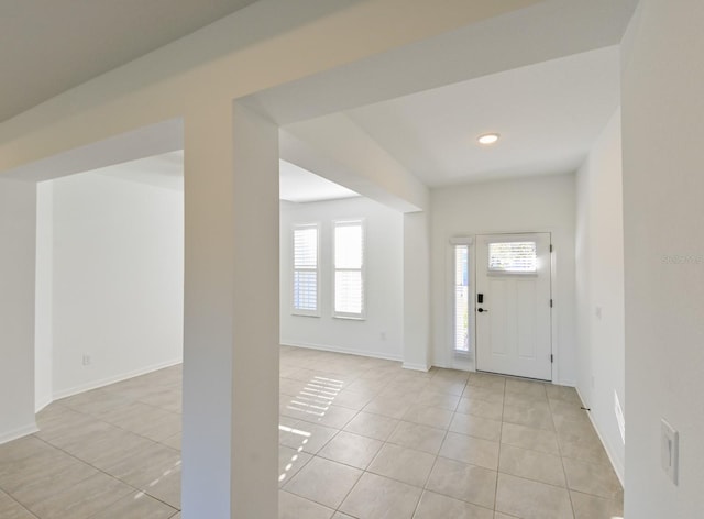 tiled entryway featuring plenty of natural light