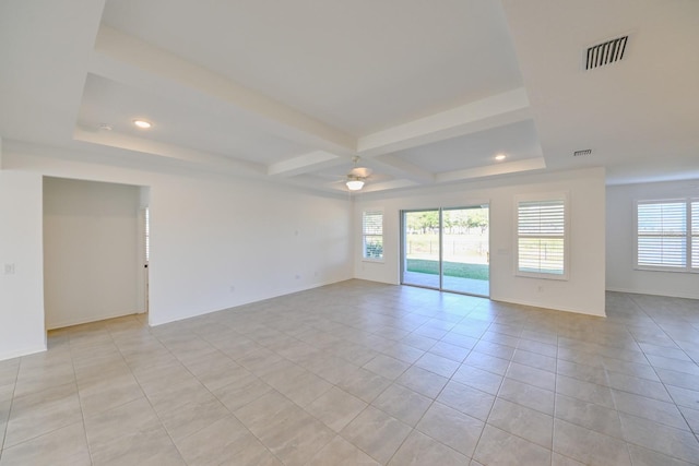 tiled spare room featuring beam ceiling, ceiling fan, and coffered ceiling