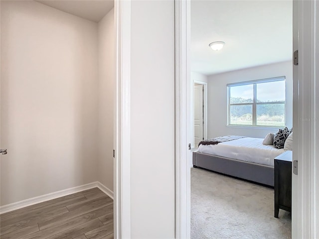 bedroom featuring hardwood / wood-style floors