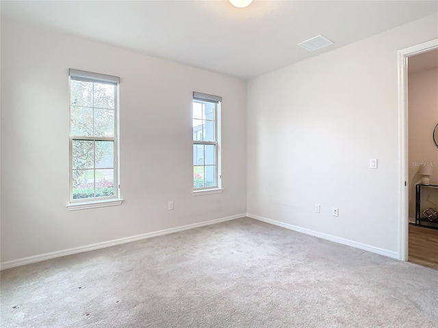 view of carpeted spare room