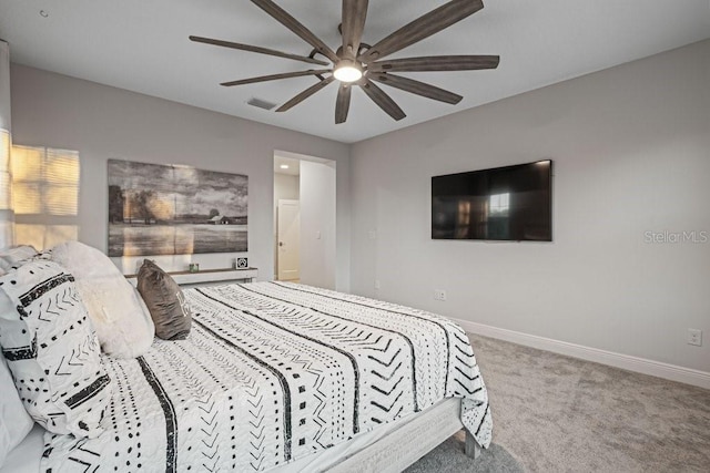 carpeted bedroom with ceiling fan