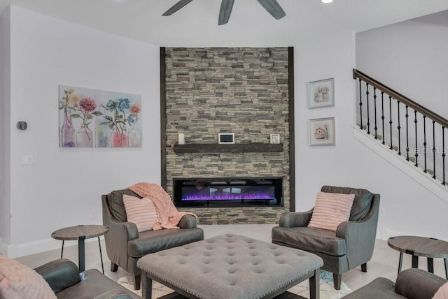 13019 Paddock Wood Pl, Riverview, FL 33579 - living room with a ceiling fan, a glass covered fireplace, recessed lighting, and stairway