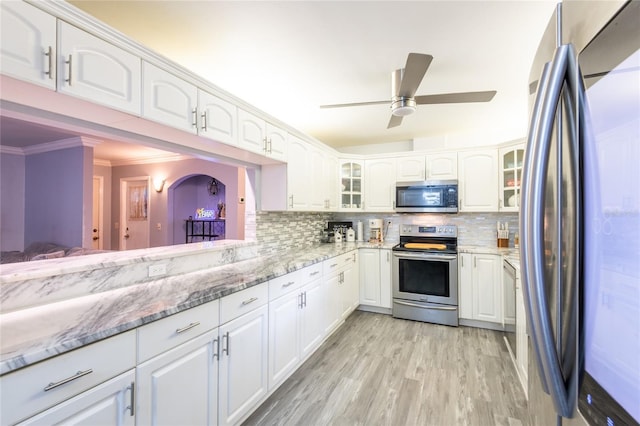 kitchen featuring white cabinetry and stainless steel appliances