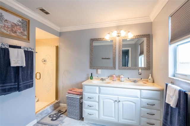 bathroom with vanity, tile patterned floors, an enclosed shower, and ornamental molding