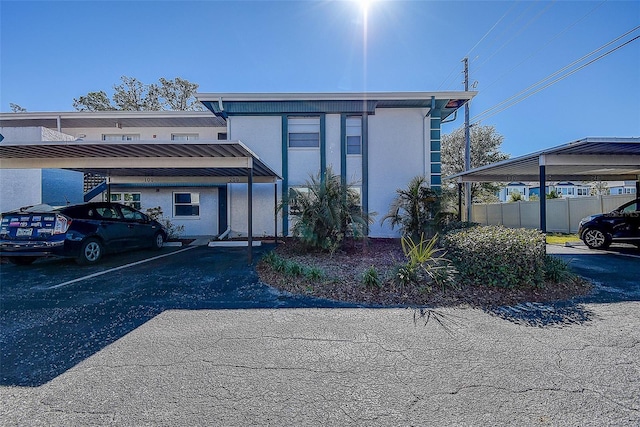 view of front of home with a carport