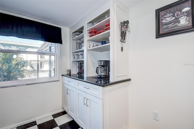 kitchen with white cabinets