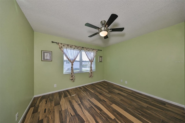 unfurnished room featuring ceiling fan, dark hardwood / wood-style flooring, and a textured ceiling