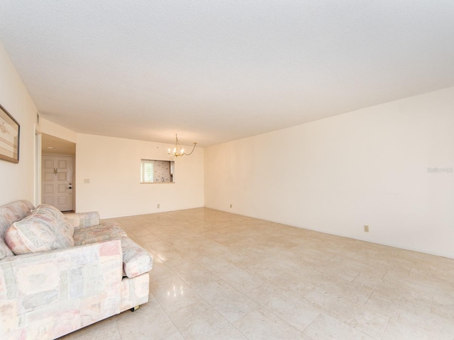 living room featuring a notable chandelier