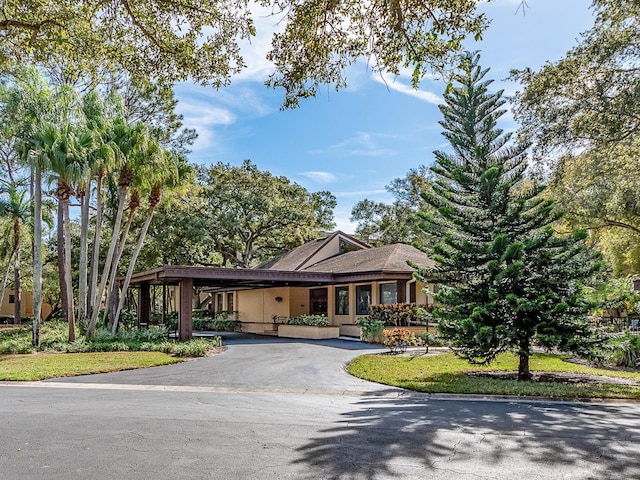 view of front of property with a carport