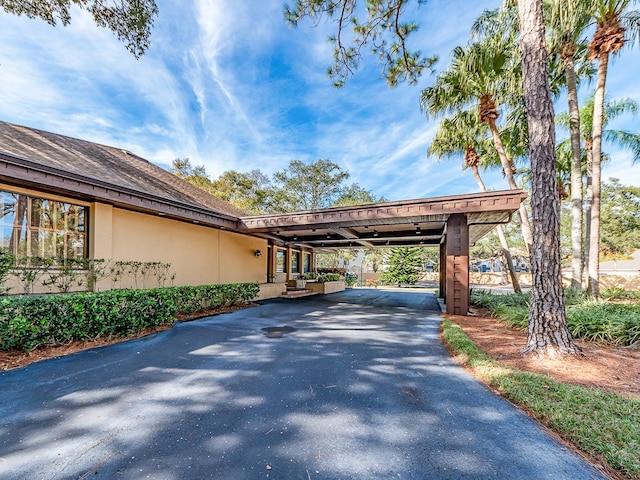 exterior space featuring a carport