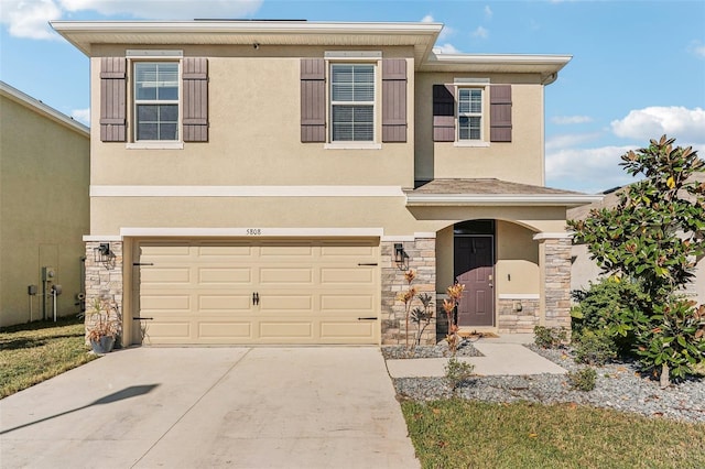 view of front of property featuring a garage