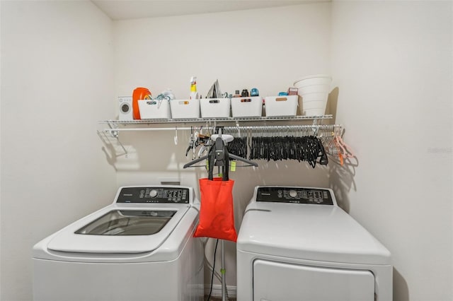 laundry area with washer and clothes dryer