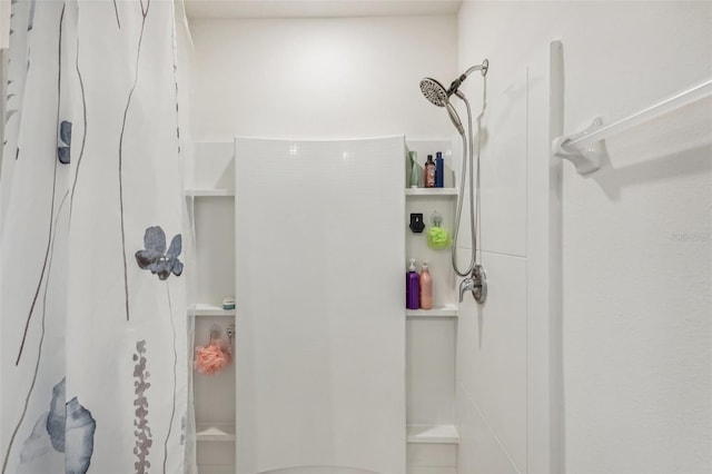 bathroom featuring walk in shower