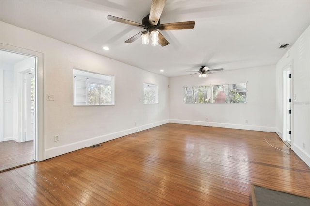 interior space featuring hardwood / wood-style flooring and ceiling fan