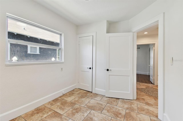 unfurnished bedroom with a closet