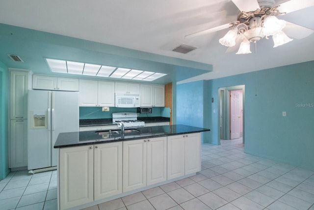 kitchen with white cabinetry, sink, ceiling fan, and white appliances