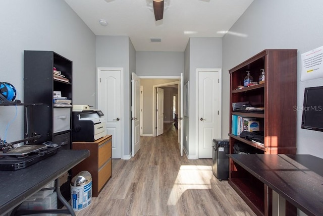 office featuring ceiling fan and light wood-type flooring