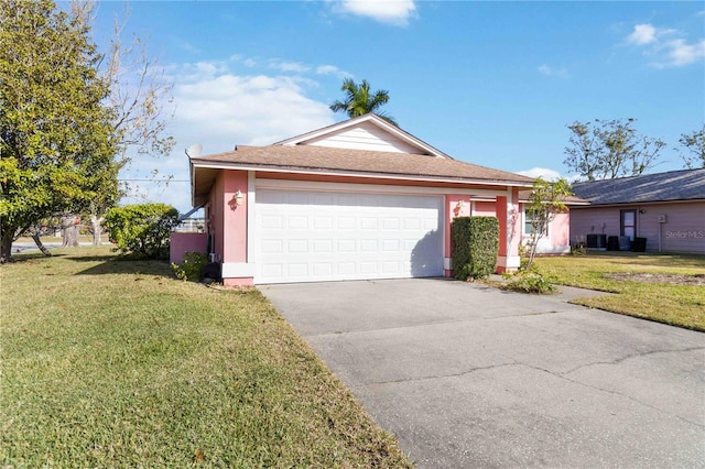 single story home featuring a garage, a front yard, and central air condition unit