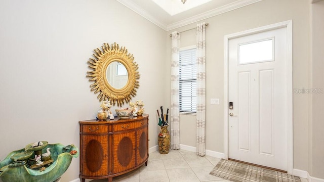 entryway featuring light tile patterned floors and crown molding