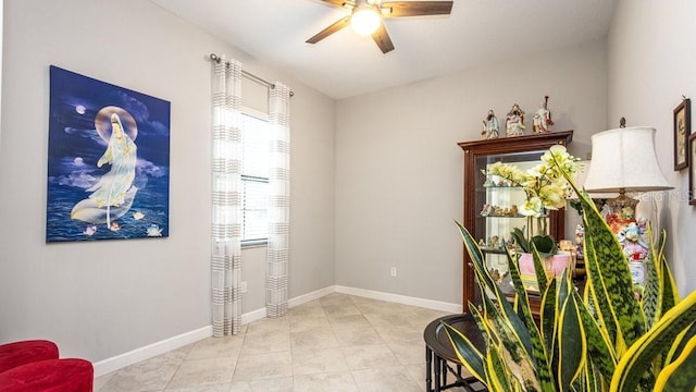 interior space with a wealth of natural light and ceiling fan