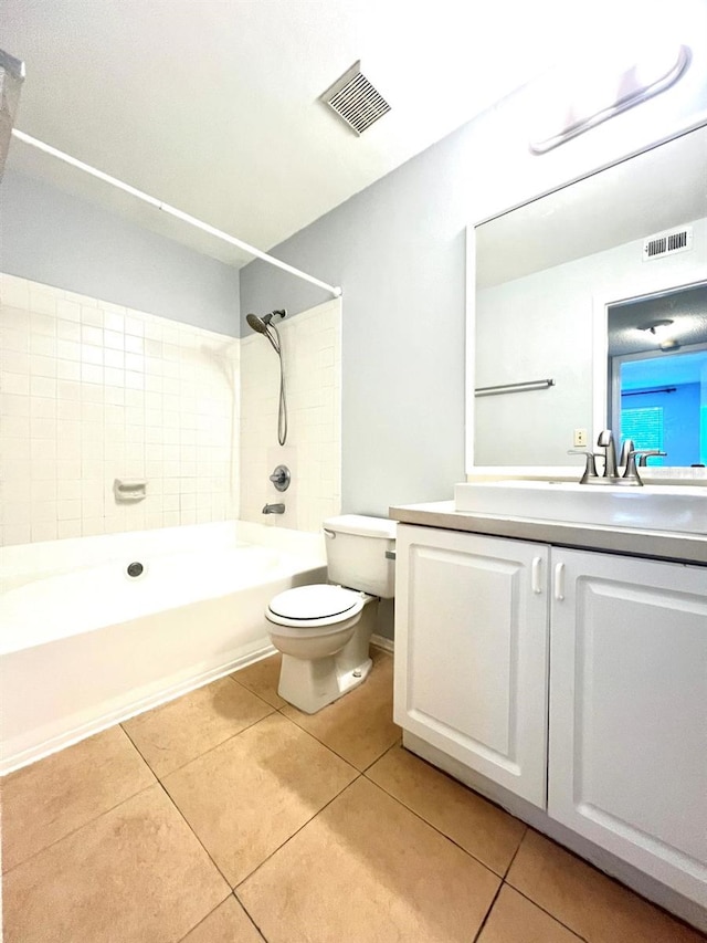 full bathroom with tile patterned flooring, toilet, bathtub / shower combination, and visible vents