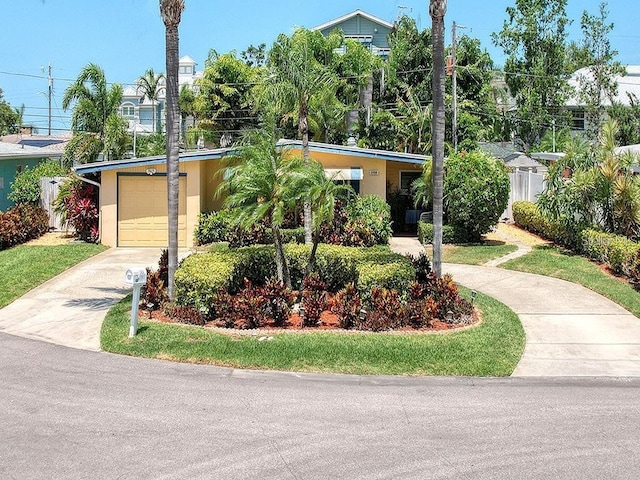 single story home with a garage