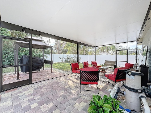 unfurnished sunroom featuring a healthy amount of sunlight