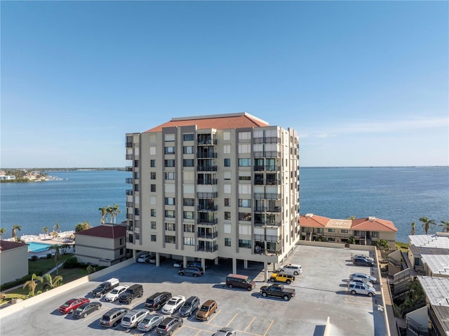 view of building exterior with a water view