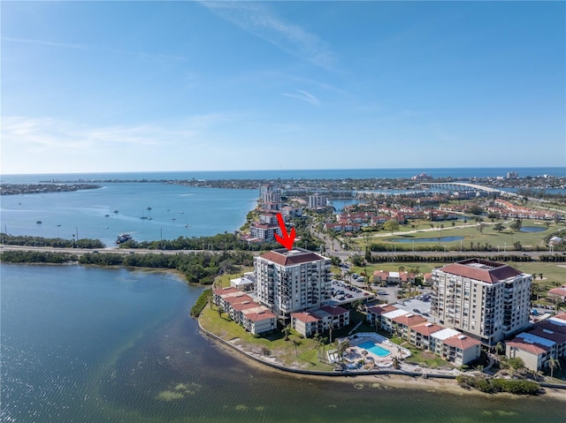 birds eye view of property featuring a water view